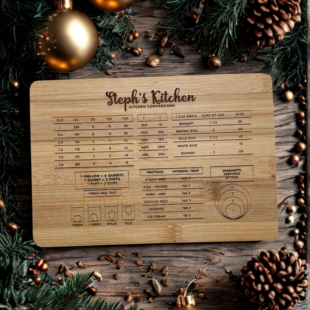 Custom engraved bamboo cutting board showing kitchen conversion chart and personalized name.
