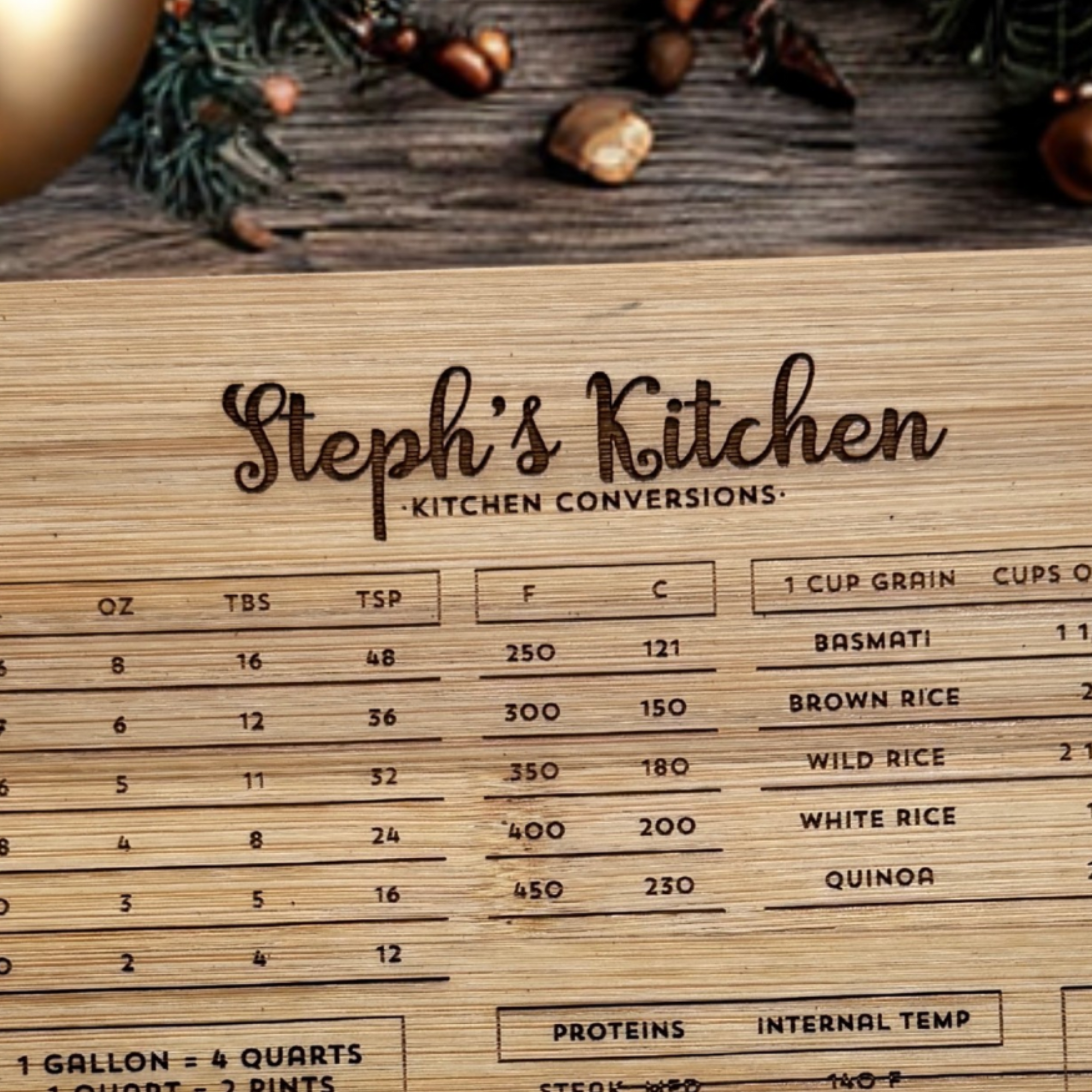 Close-up of engraved personalized name and detail of engraving on bamboo kitchen conversion cutting board.